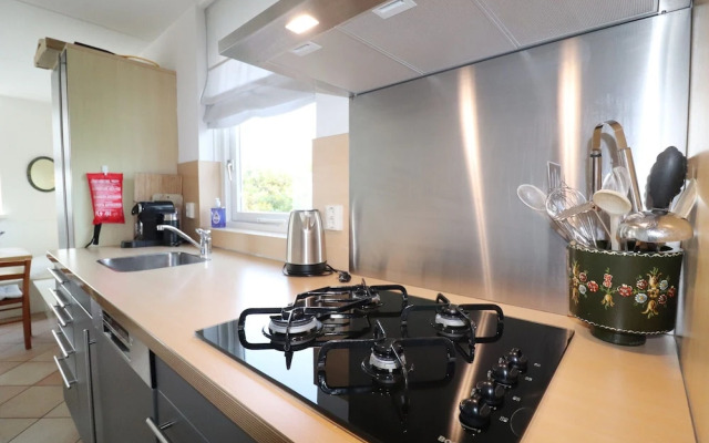 Nice Holiday Home on the Water in Grou