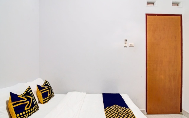 SPOT ON 91950 Guest House TekNong Syariah – Guest Rooms – Bangkinang