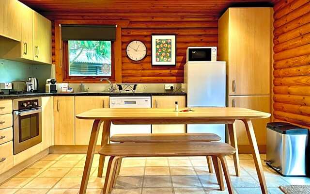 Riverside log cabins