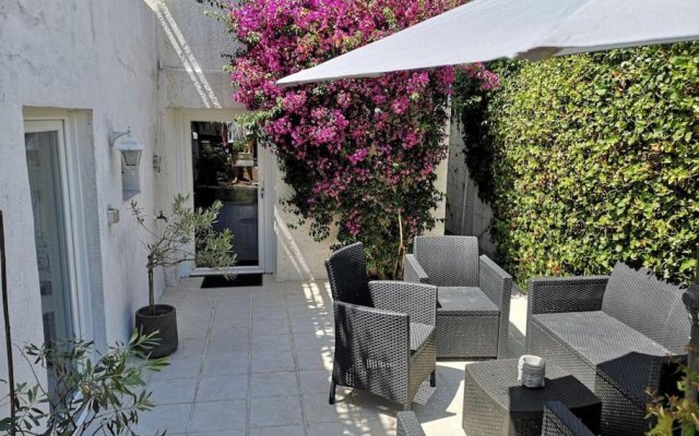 Appartement 50 m2 dans une maison privative avec terrasse et jardin privée