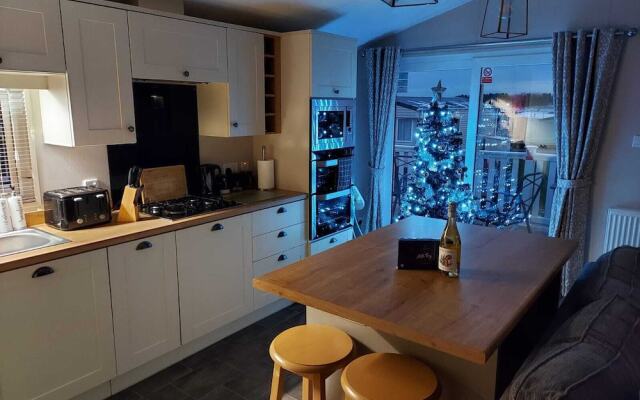 Cayton Pines Lodge at Cayton Bay Holiday Park