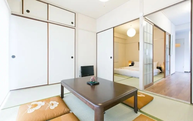 Aki Building 402