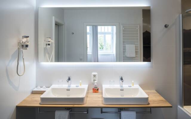 Romantik Residenz Ferienwohnungen Hotel Im Weissen Rössl