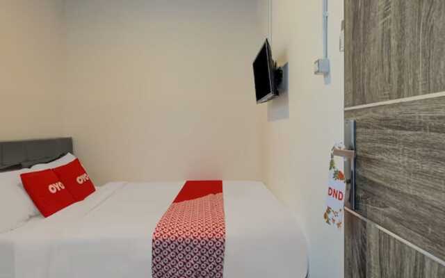 Capital O 3198 Sukomanunggal Inn