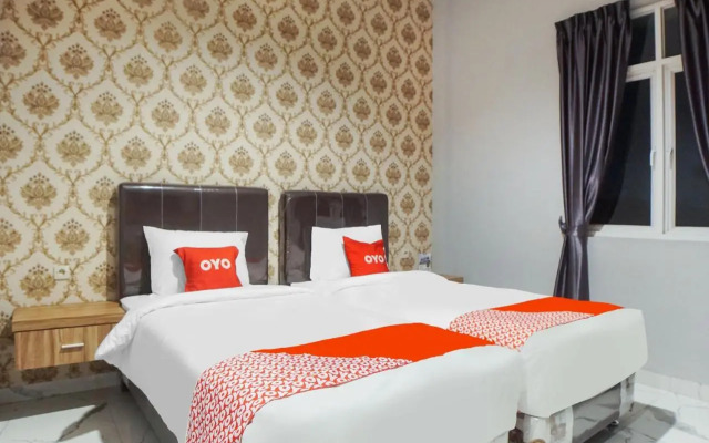 Super Oyo Capital O Papakoel Hotel & Cafe