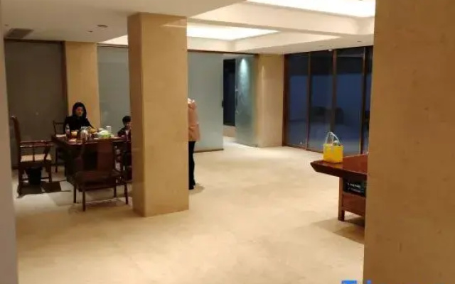 Haikou Zhouren Apartment (Wanda Plaza Convention and Exhibition Center)