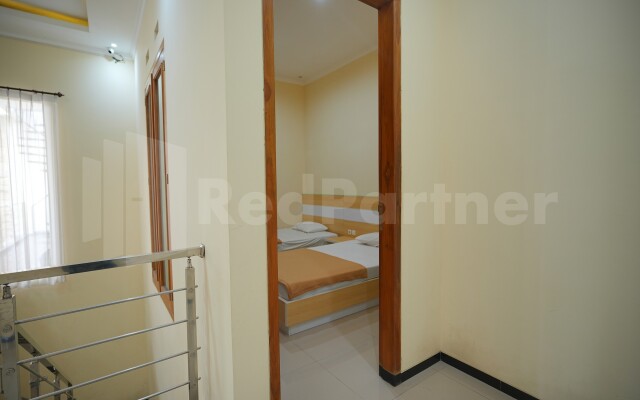 One & Quin Guest House Syariah