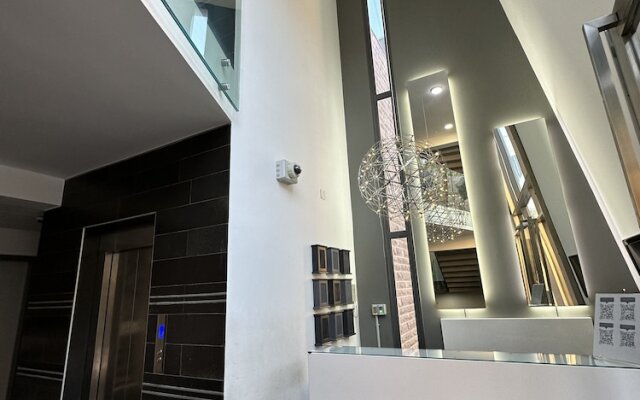 Grey Escape Apartements
