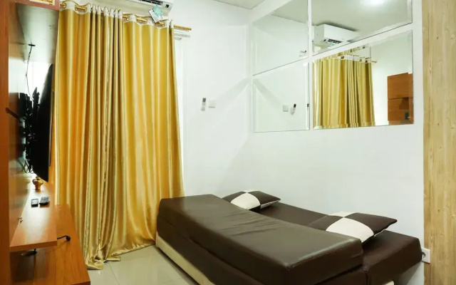 2BR Apartment with Sofa Bed at Woodland Park Residence By Travelio