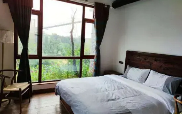 Mengzhou Hejia Courtyard Hotel