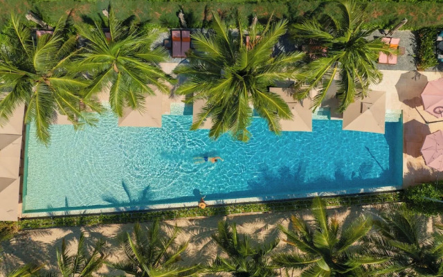 Signature By M Village Beachfront Hotel