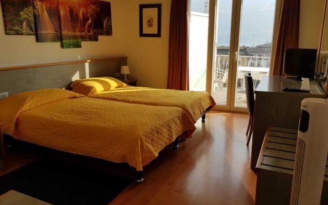 Hotel Garni Montaldi – Guest Rooms – Muralto