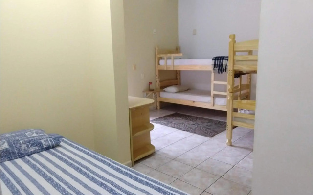 Casa 5 suítes com piscina e churrasqueira