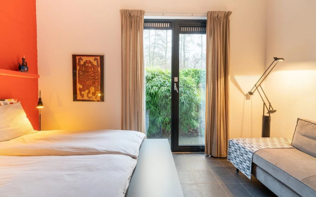 Cozy Forest Villa on the Water Near Harderwijk