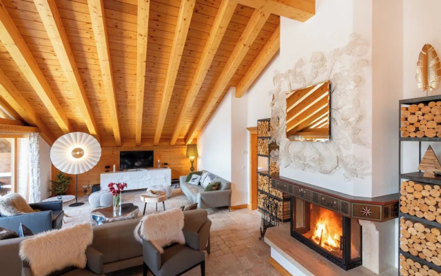 Mountain Exposure Luxury Chalets & Penthouses & Apartments