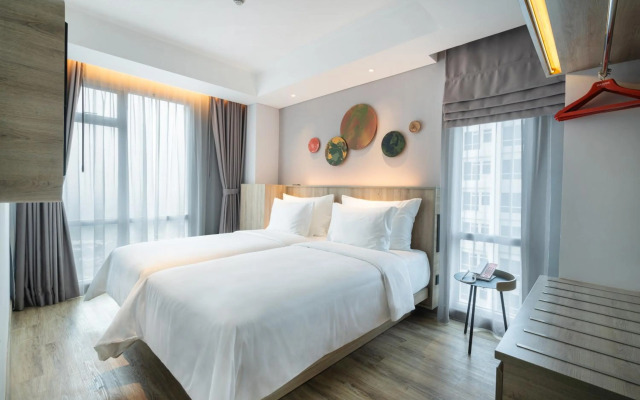 HARRIS Suites Puri Mansion