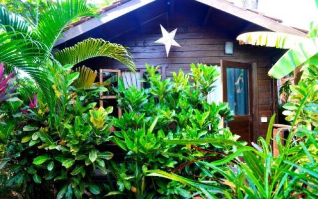 Pele's Windsong Wood Cottage on the beach