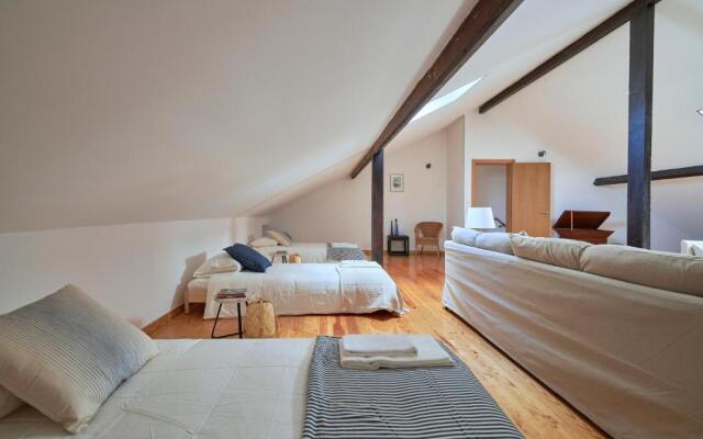 Renovated and Spacious Duplex Apartment With Patio, By TimeCooler