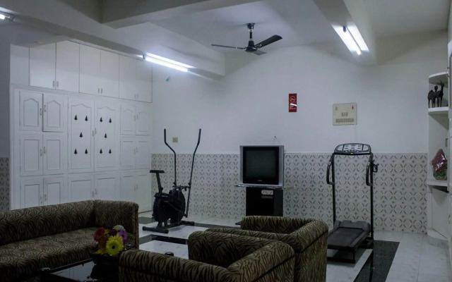 Rose Flower Service Apartment by OYO Rooms