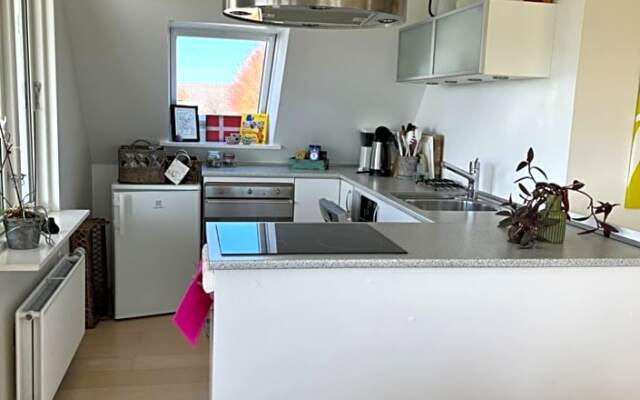 Apartment Ruhetgaard Bed & kitchen