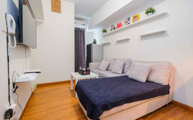 Homey 2BR with Pool View Apartment @ Springlake Summarecon By Travelio