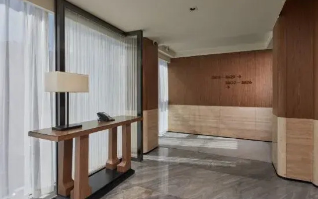 DongGuan Tangxia Vanke Plaza Huaman Hotel