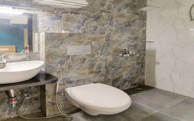 Radhika Ex by OYO Rooms