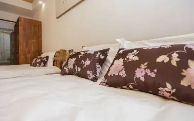 Aiqinhai Guesthouse