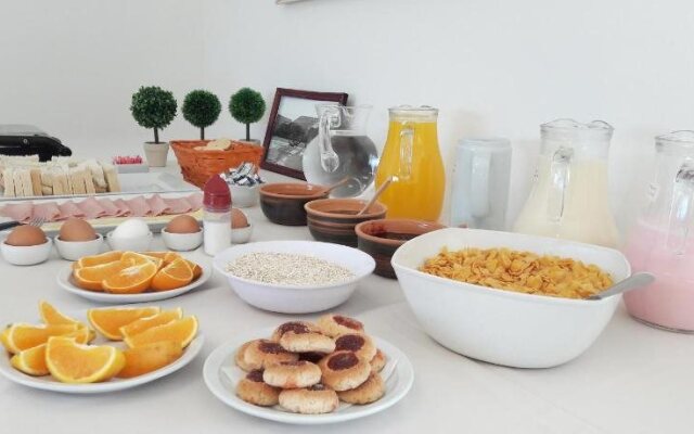 Apart Hotel el Jardin de los Presentes