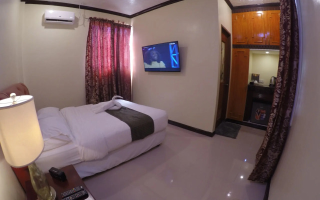 The Executive Villa Inn & Suites