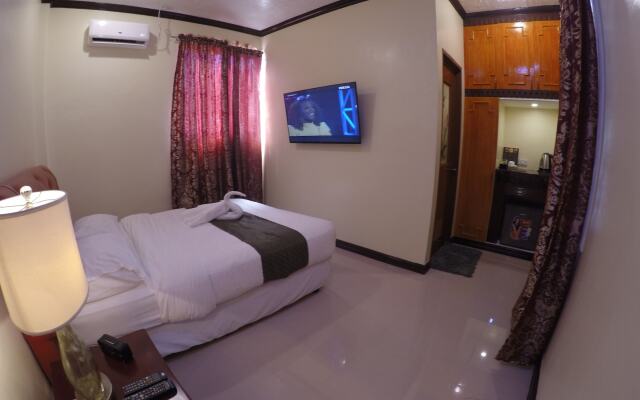 The Executive Villa Inn & Suites