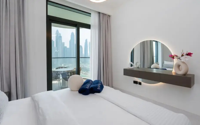 Modern 2BR Emaar Beachfront w Pvt Beach Access