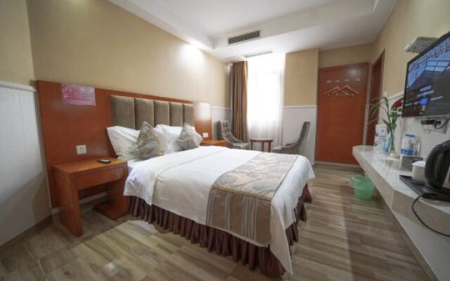 Yi Long Hua Chen Impress Business Hotel