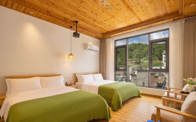 Wuyuan Nuanxinju Inn (Huangling Scenic Area Branch)