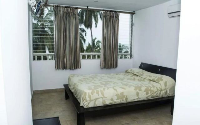 Apartamento con playa privada y piscina
