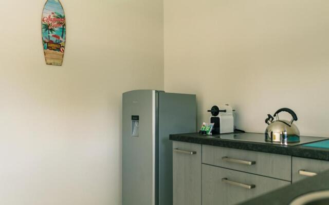 Hideout Suites - steps from Eagle Beach