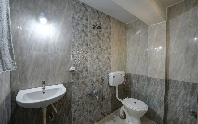 SPOT ON 37153 Karavali Paradise