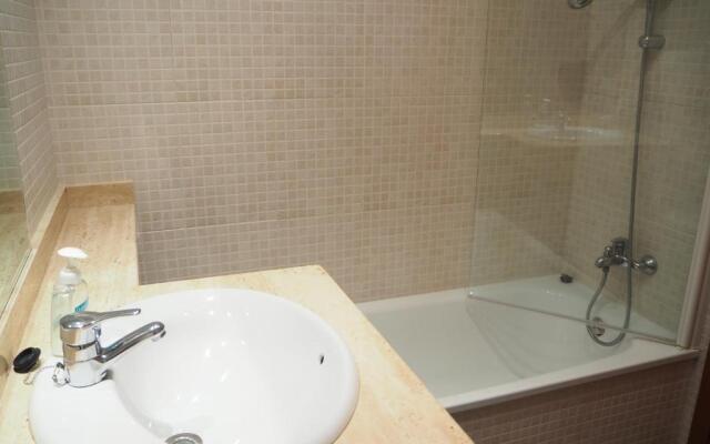 Casa l'Escala, piscina comuntària i jardí privat