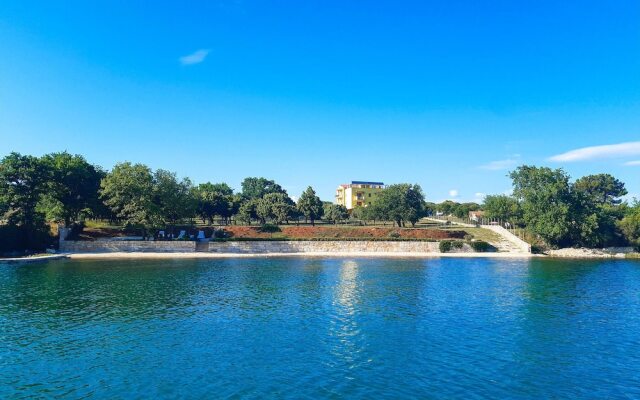 Awesome Apartment in Pomer With 2 Bedrooms