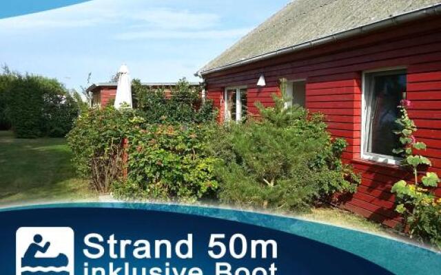 Roter Bungalow am Strand _50m_ _ O