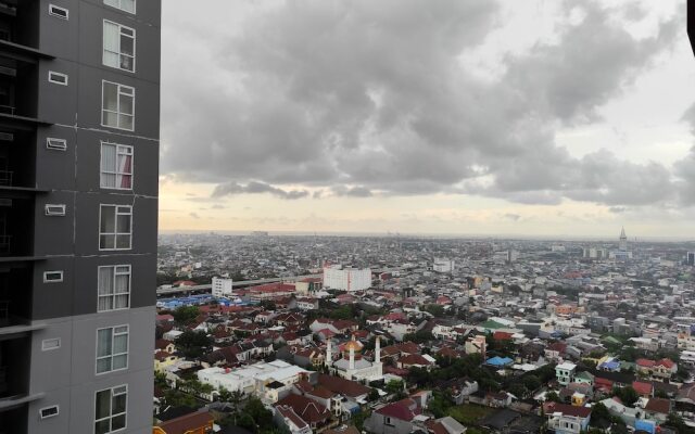 Comfy Studio At Vida View Makassar Apartment