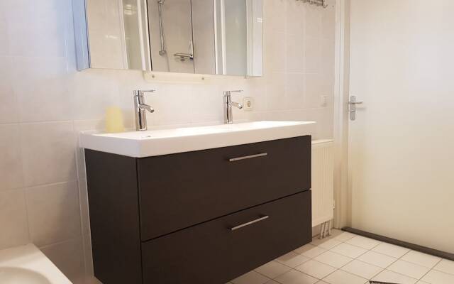 Exclusive Holiday Home Floating on a Lake in Friesland