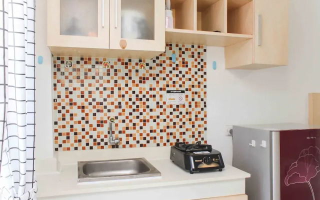 Simple and Cozy Living Studio Room at Bassura City Apartment