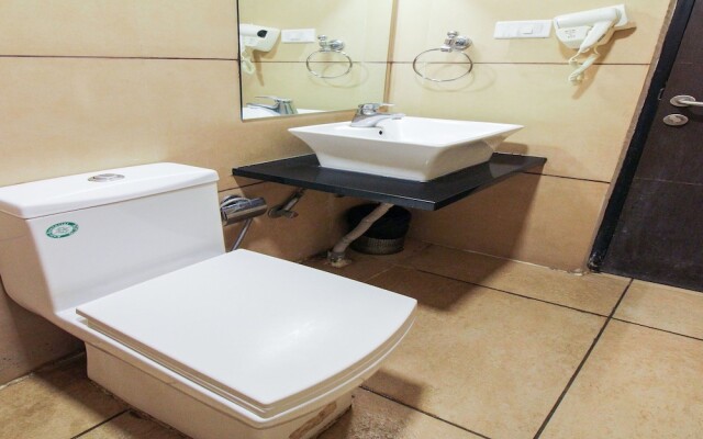 Capital O 15964 NI Ambaari Suites