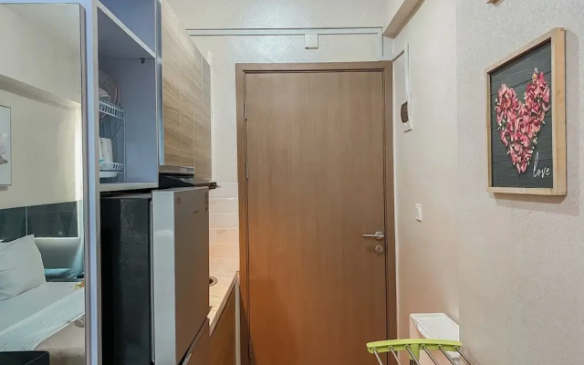 Warm and Homey Studio at Podomoro Golf View Apartment
