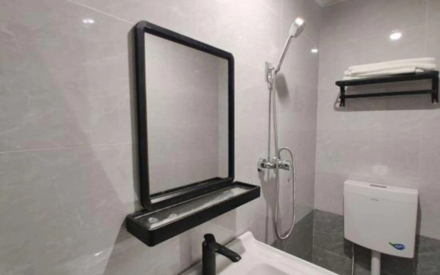 Xinyi Business Hostel