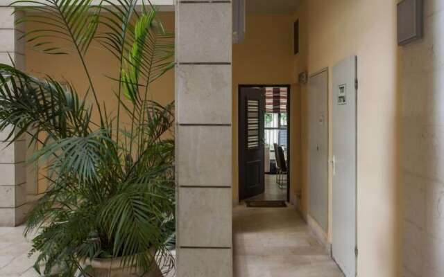 Family Apt & Private Garden near Beach by FeelHome