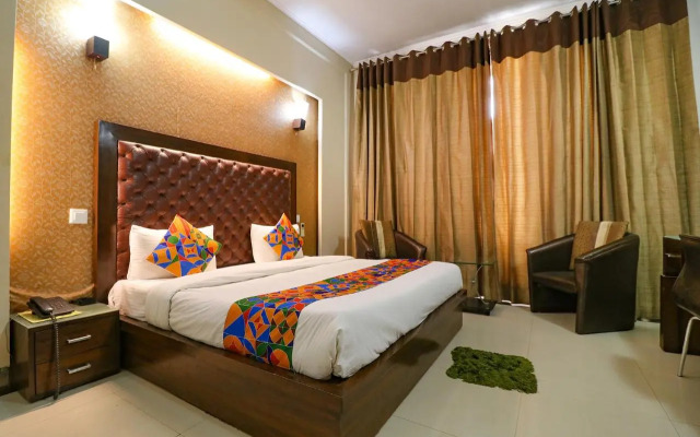 FabHotel Happy Residency