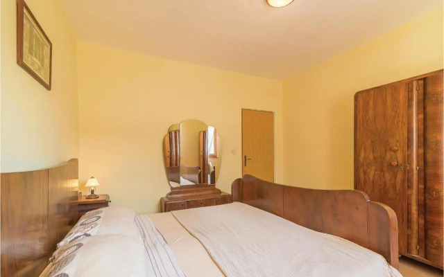Two-Bedroom Holiday home Jezera with a Fireplace 05