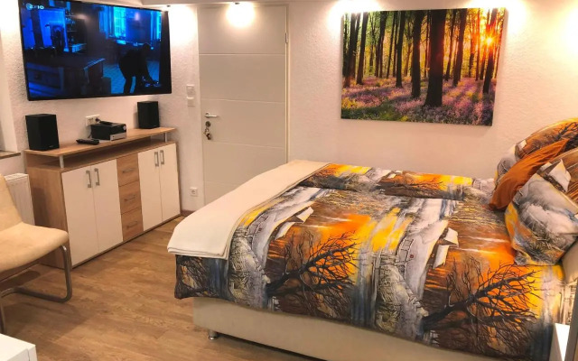 Ferienwohnung Apartment Dettum mit eigenem Bad, Kochnische und Wintergarten